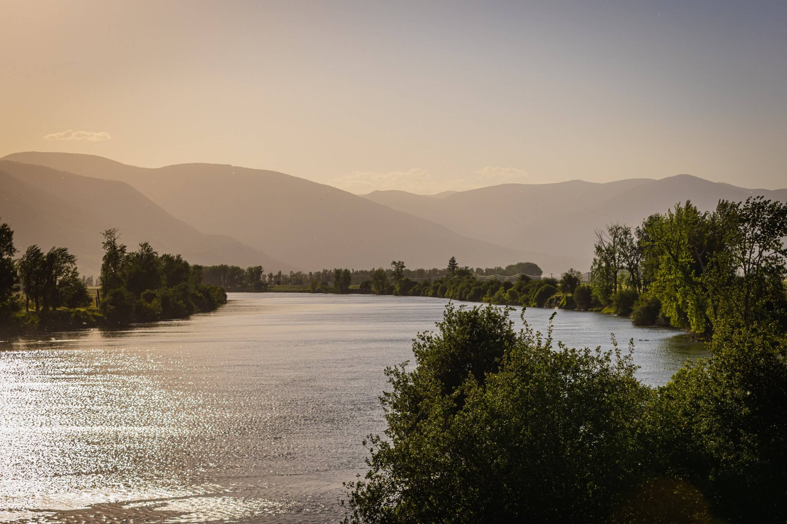 A scenic shot of the Kootenai River at dusk.