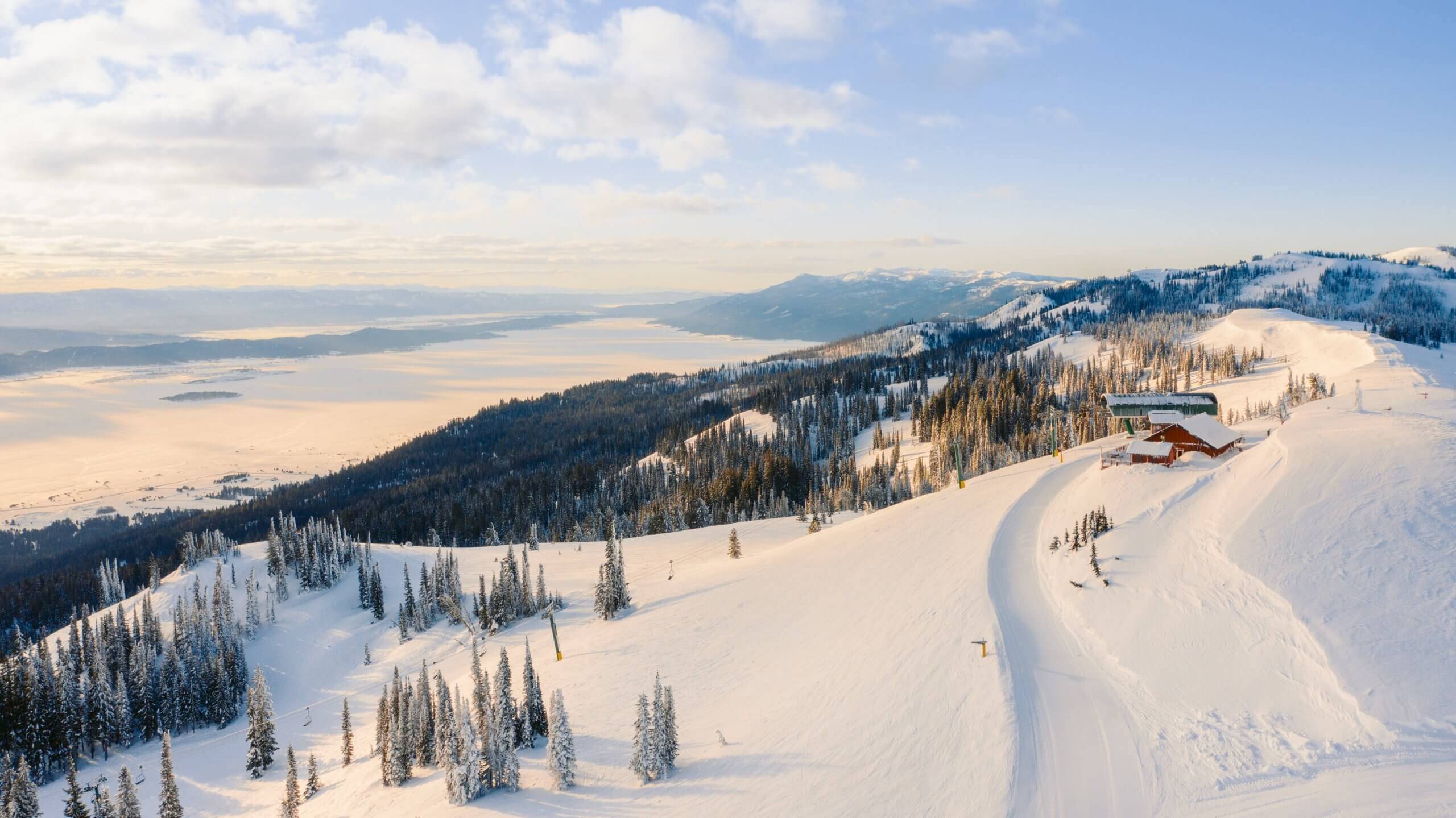 An aerial view of snowy-covered Tamarack Resort.